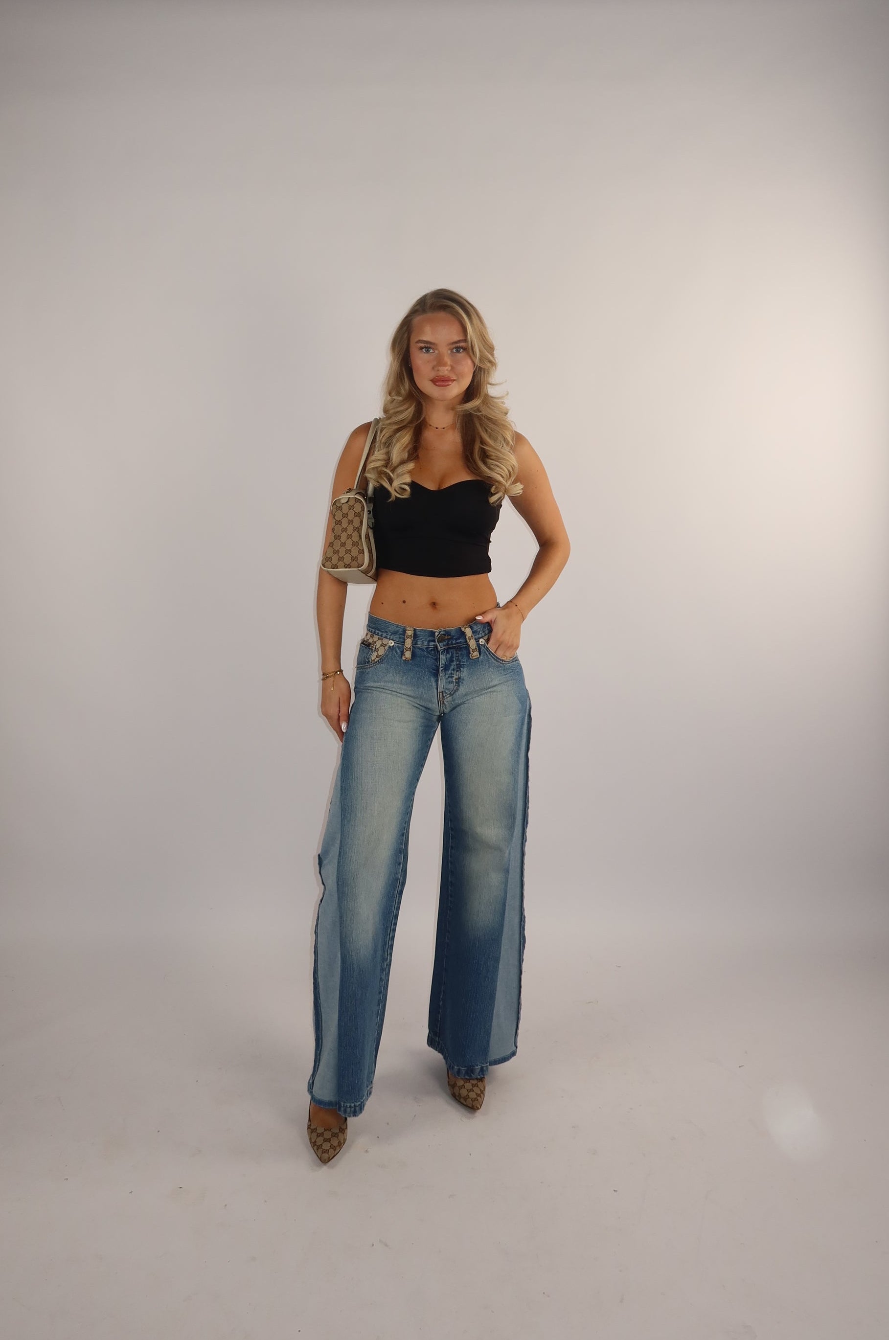 "TWO SIDES' Gucci reworked jeans