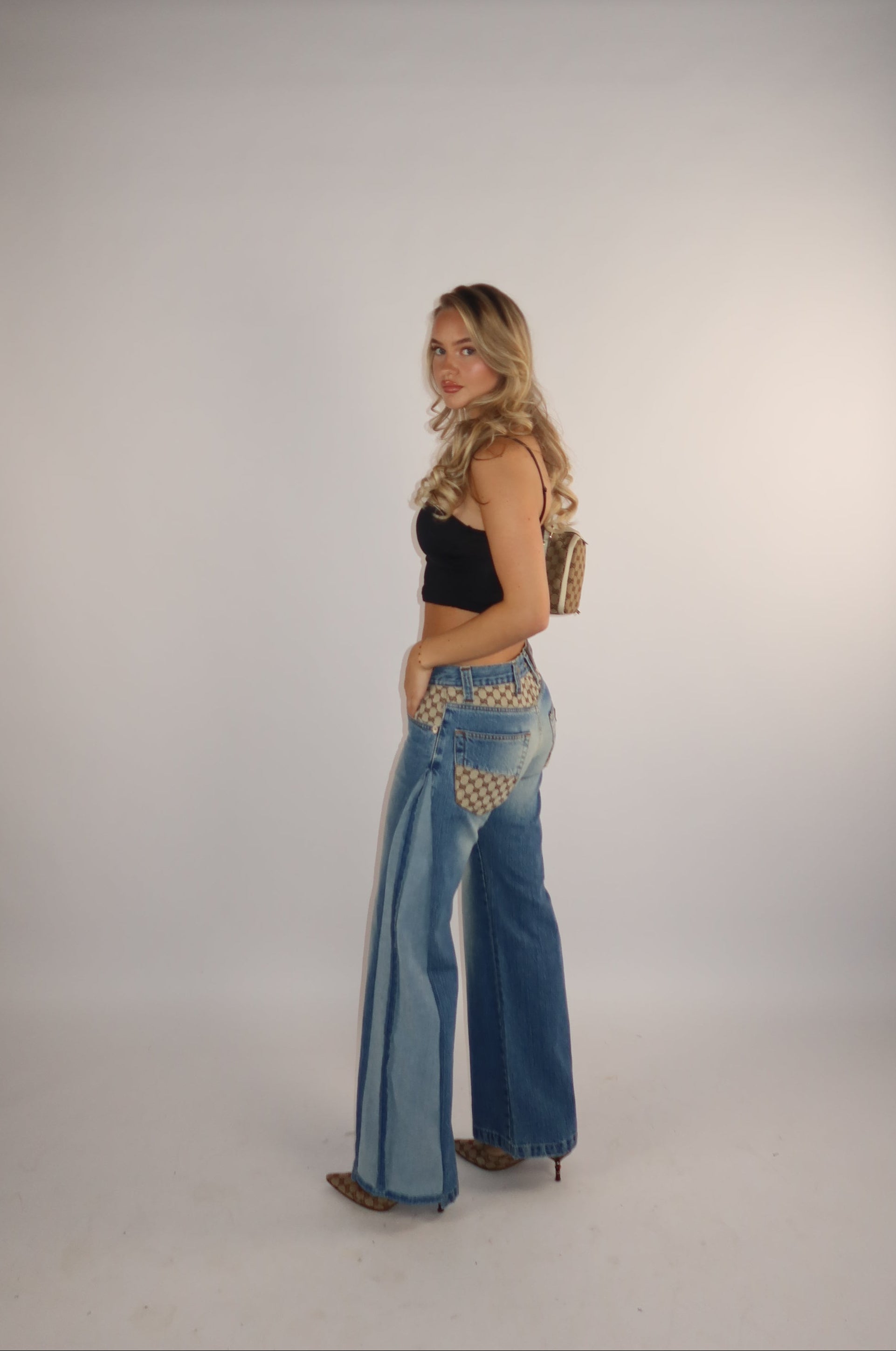 "TWO SIDES' Gucci reworked jeans